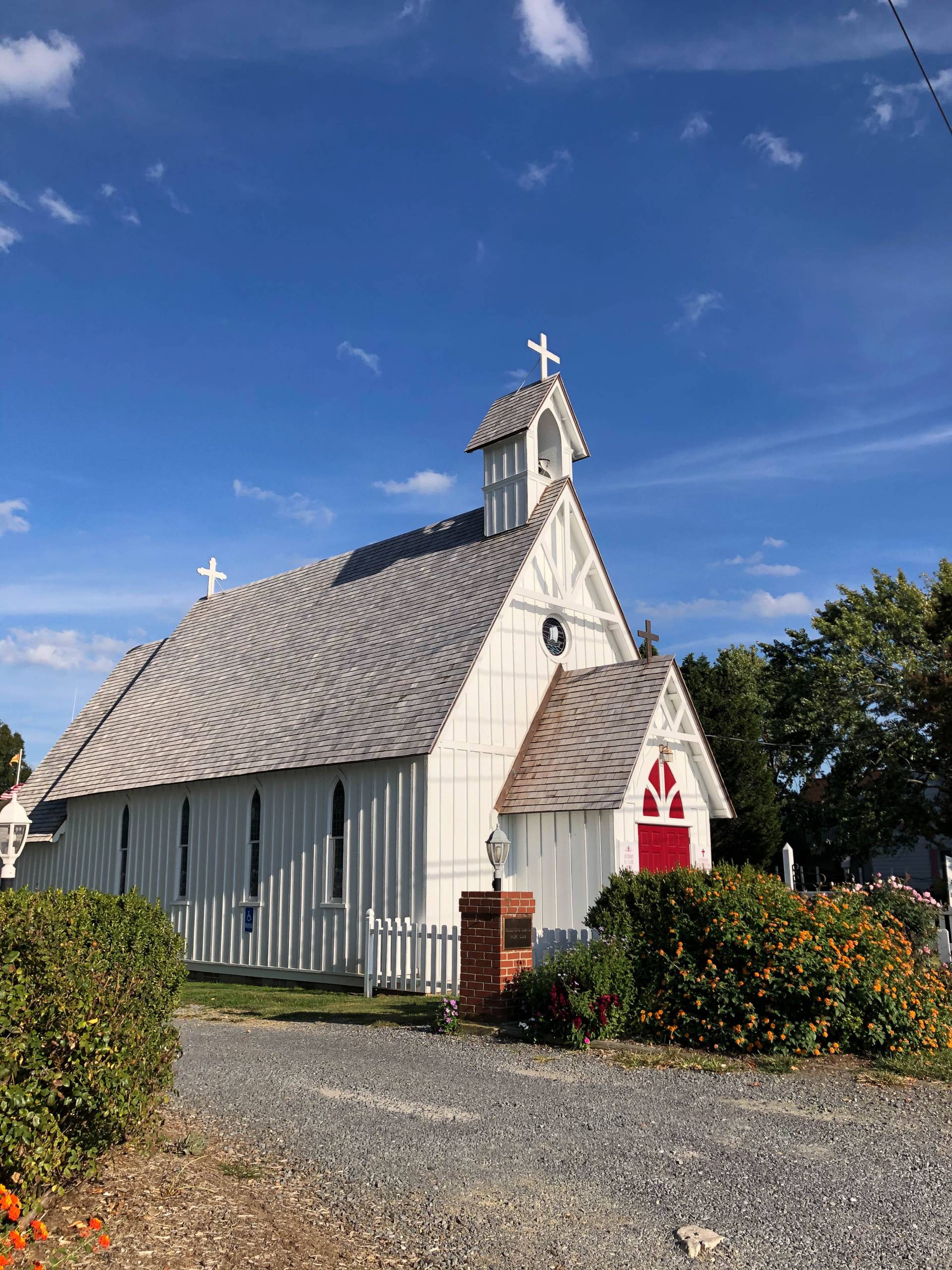 white church with red door