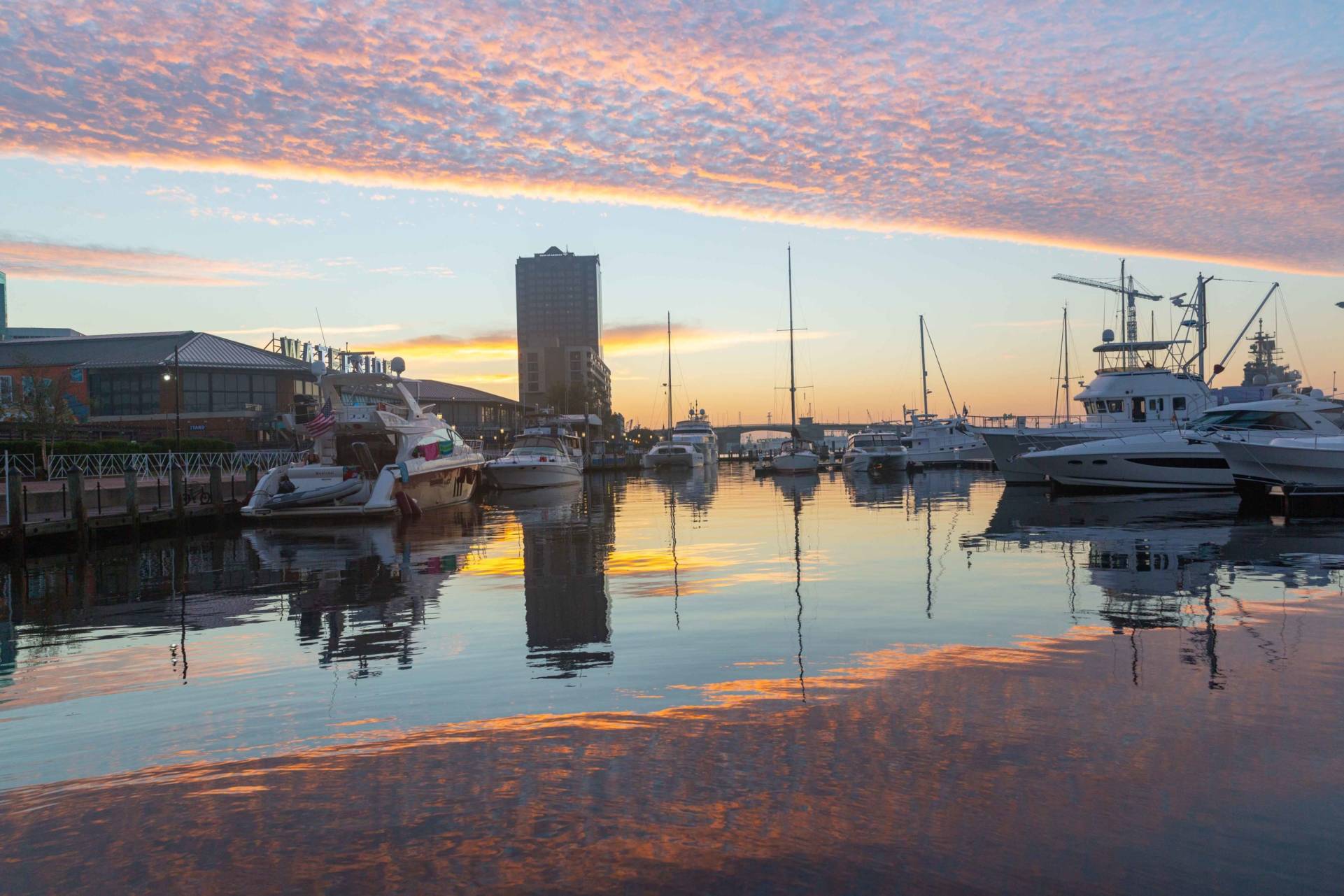 boats sunrise waterside marina